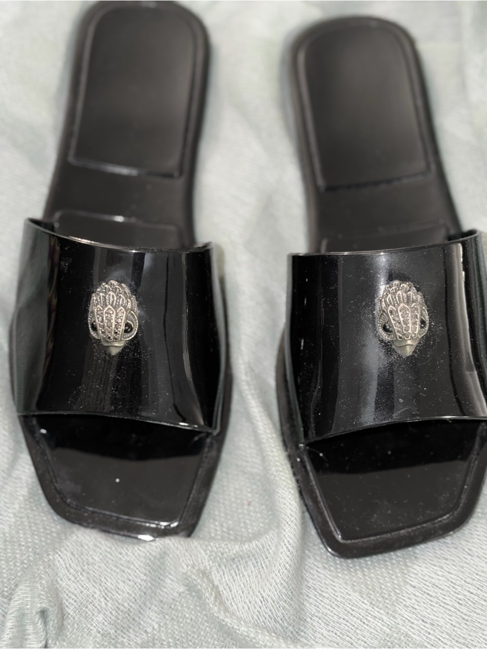 Kurt Geiger Black Slide Sandals with Silver Emblem